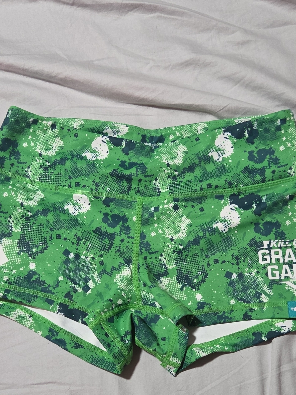 Green Printed Athletic Shorts by KILL GRADE GANG